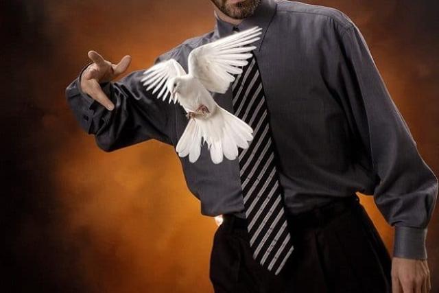 Magician Howie with a bird 