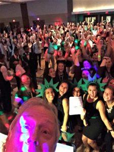 Dj rick taking a selfie in front of a crowd