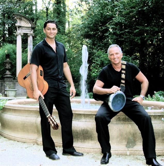 Rouzbeh and another band member in front of a fountain