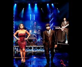 The band performing in formal attire