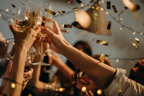 People at a party toasting