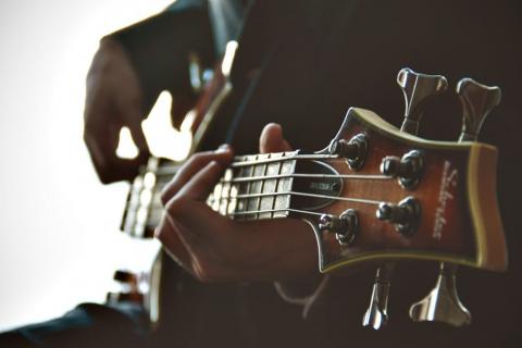 Someone playing guitar