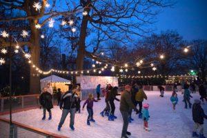 People skating at a ice rink