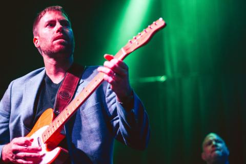 A man playing guitar