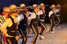 A mexican band dancing