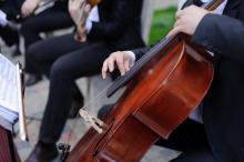 A man playing the cello